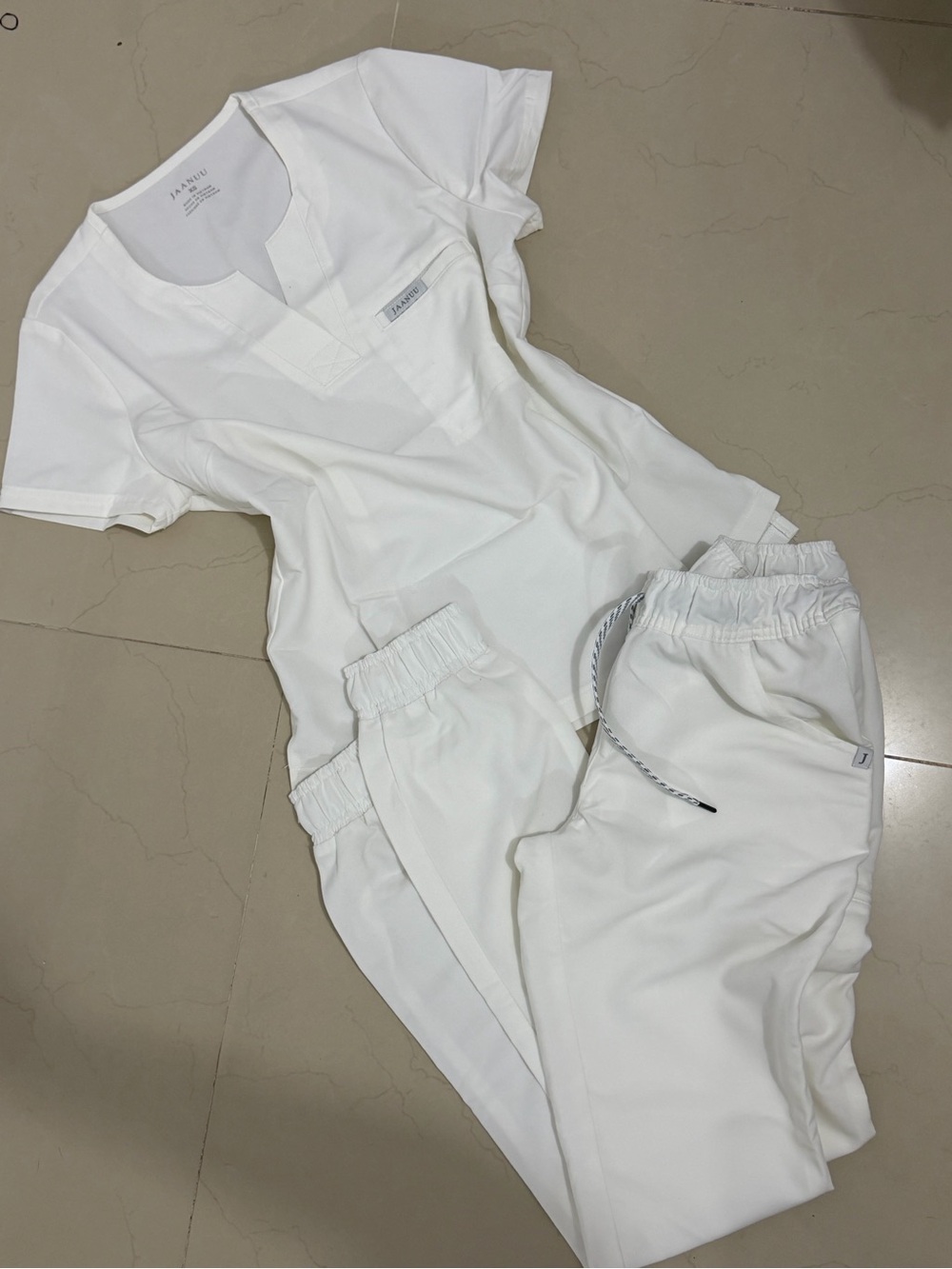 Jaanuu Women's White Scrub Top and Jogger Set